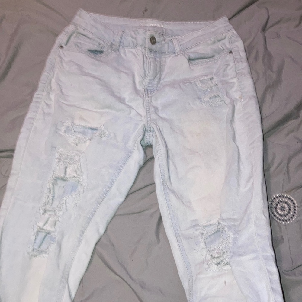light mid rise jeans padded rips size 9!